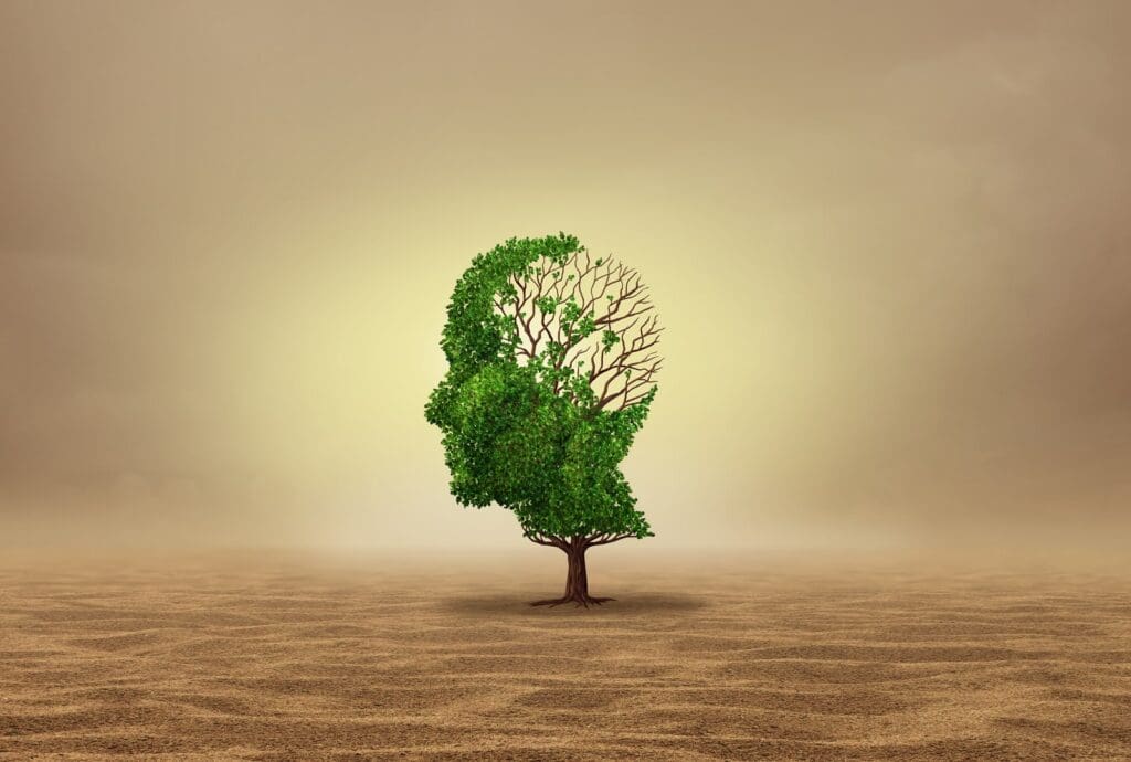 An illustration of a tree in the shape of a human head