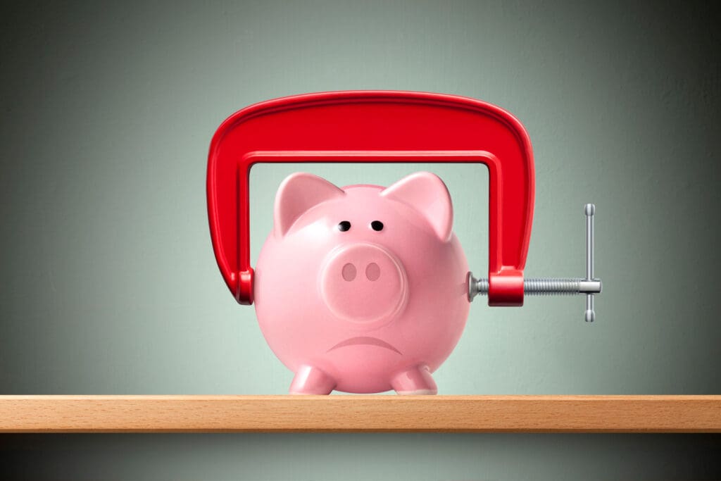Piggy Bank in a G Clamp on shelf.